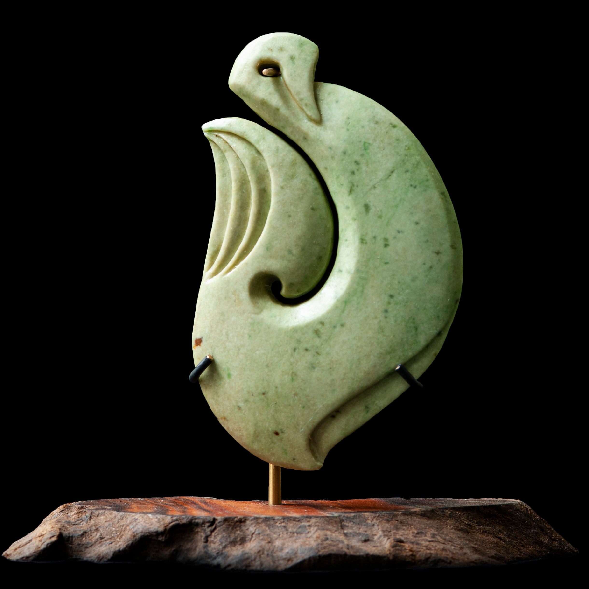 Pounamu Matau Sculpture on stand by Alex Sands
